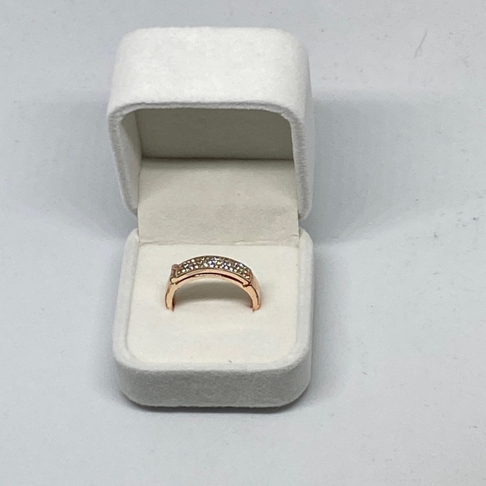 Rose gold toned ring with white sapphires, size 11